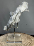 Witte rooscalciet met pyriet – UV-reactief